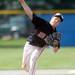 Milan High School pitcher  sophomore Thomas Lindeman throws a pitch during the fourth inning of the MHSAA baseball quarterfinals against Coldwater High School at Nichols Field at Bailey Park in Battle Creek on Tuesday, June 11, 2013. Melanie Maxwell | AnnArbor.com